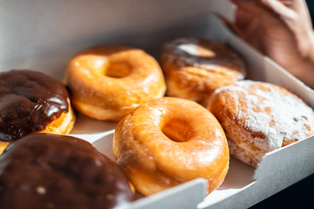 A Half Dozen Dunkin' Donuts including the popular Boston Kreme